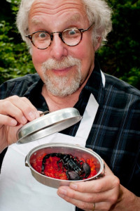 "The Bug Chef" with a cooked scorpion. Photo by Jeff Cole.