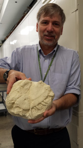 Ted Daeschler with a cast of the jaw specimen.