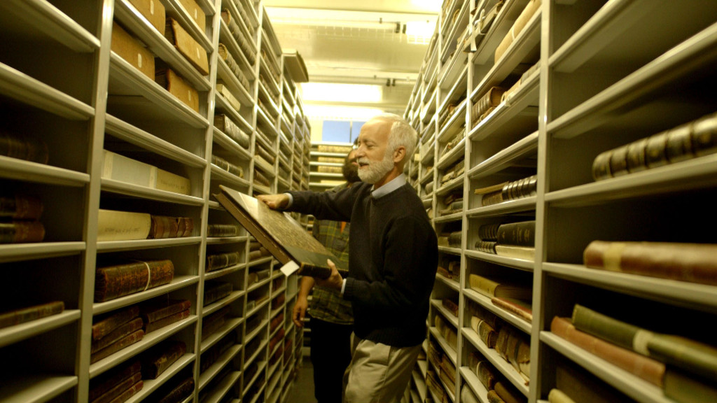 Senior Fellow Robert Peck and Hitnes in the archives.
