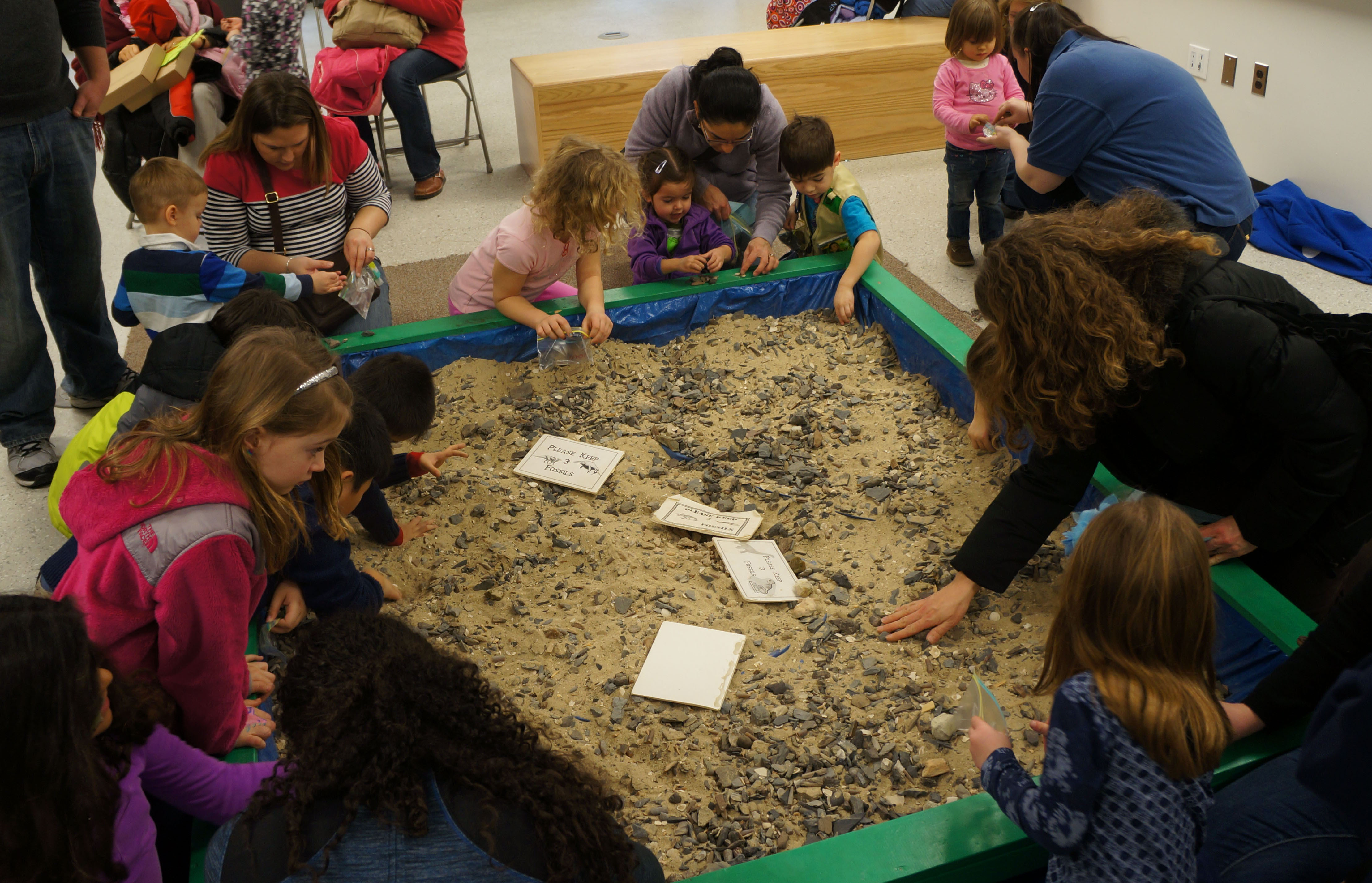 Digging for fossils is a family affair at Paleopalooza. Photo by Will Klein.