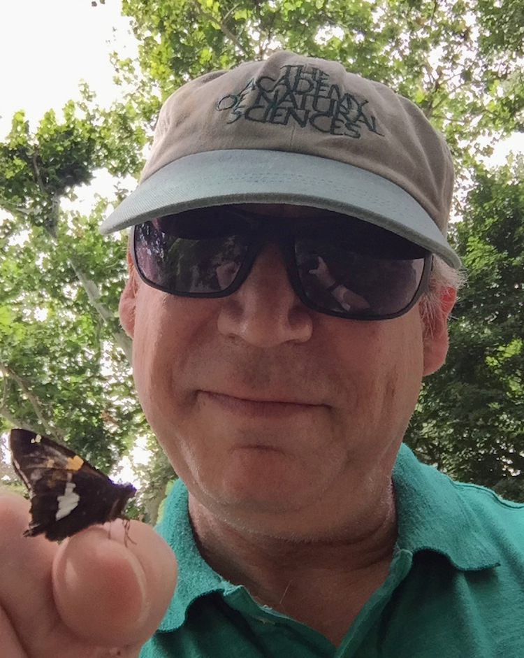 Jason Weintraub holds an insect friend.
