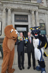 Announcing the affilation with Drexel University, Drexel President John Fry (left) and George Gephart flanked by friendly mascots.