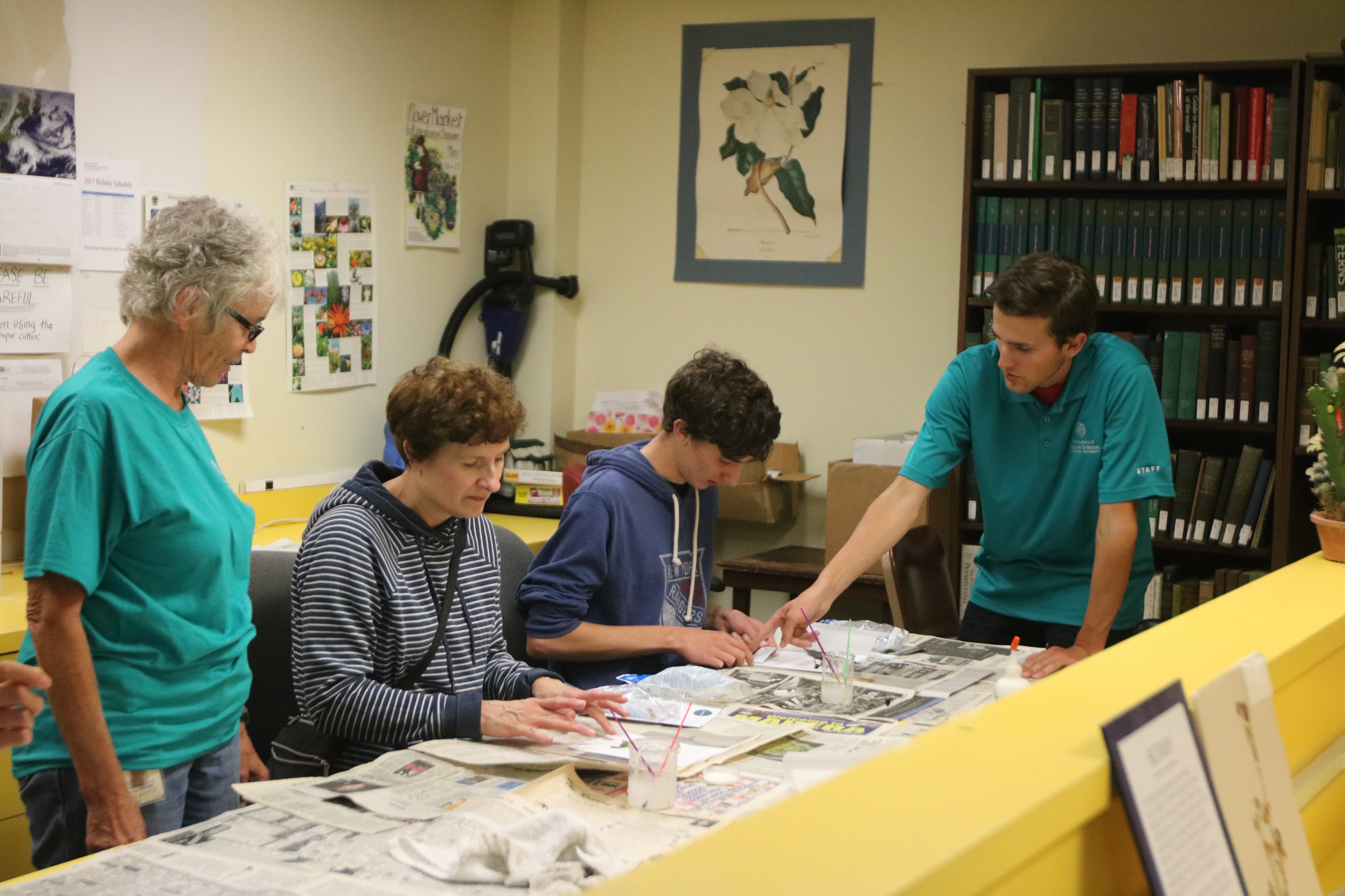Members learn how to make their own herbarium