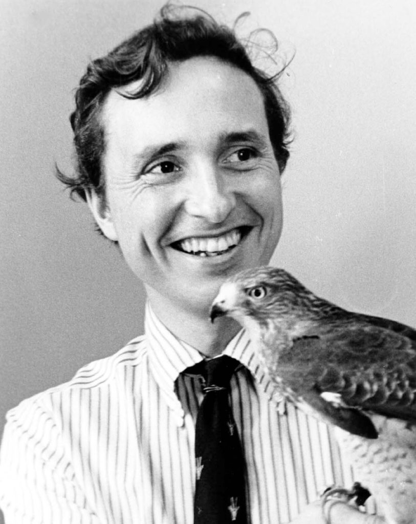 Tom Lovejoy smiling circa 1972 holding bird