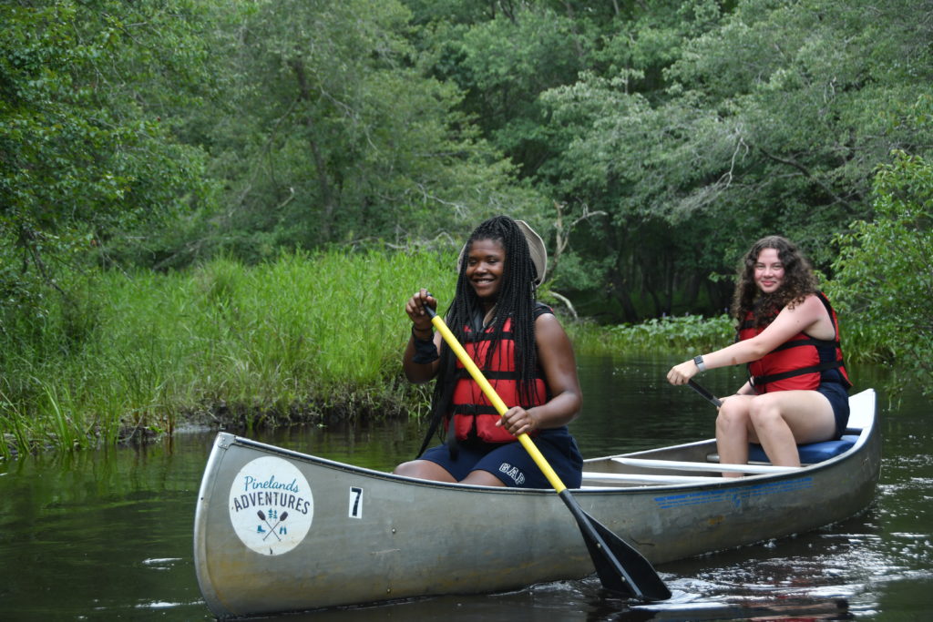 two young scientists canoeing
